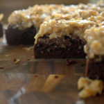 dark chocolate brownies with an ooey gooey coconut pecan icing